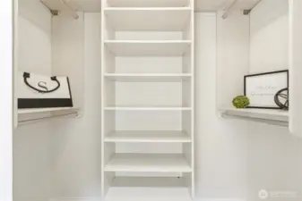 Walk-in closet offers plenty of storage and organization.