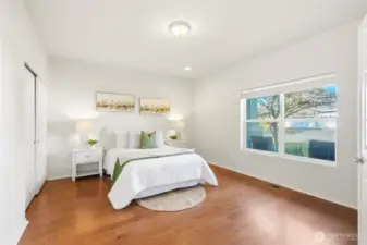 Two additional bedrooms each feature walk-in closets.