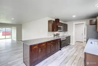 Main floor kitchen with eating space, quart countertops, all new appliances.