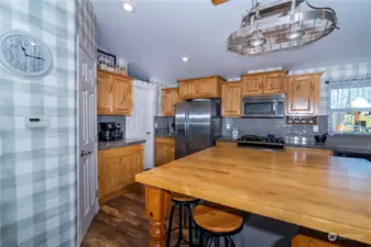 Ample Storage with cabinets and pantry.