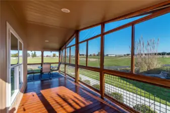 Screened deck with golf course view