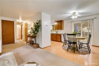 Dining room connected to the kitchen. The home has air conditioning as well as ceiling fans. This home has great temperature control throughout the year.