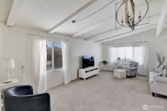 Side window also lets in natural light all day. Plantation blinds and sheers on all the vinyl windows. New carpet with an upgraded pad for your comfort.