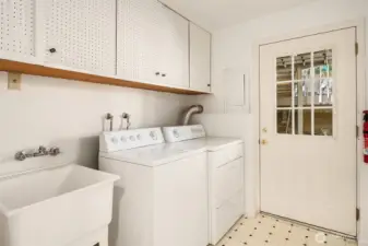 Large laundry with sink.