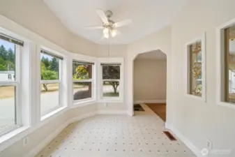 Nook area to the right of entry is a great flex space - breakfast nook? Office? Exercise area?