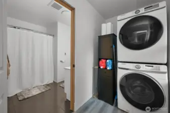 Utility room off kitchen and bathroom