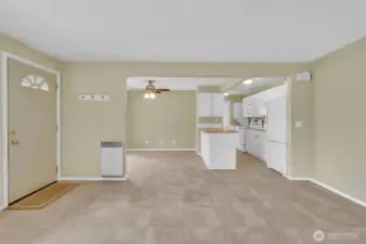 Living room looking towards the dining room and kitchen