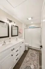 Attached 3/4 bathroom with large double vanity.