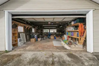 This classic home offers plenty of storage options, keeping your space organized and clutter-free while maintaining its timeless charm. Along the alley is a 2 car detached garage.