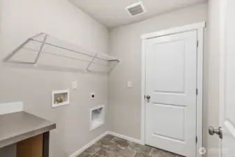 Photo is of a similar home. Colors and materials may vary.