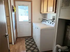 Large Utility Room with Newer Washer and Dryer.