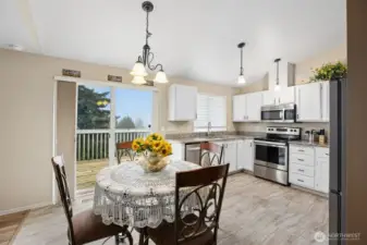 Perfect place for breakfast or an afternoon late lunch- just steps away from the back deck over looking the large lot with a territorial view.
