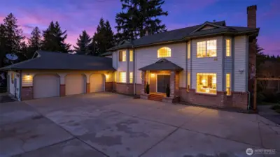 Set on the shores of Lake Desire in Renton, this exceptional lakefront home showcases true pride of ownership with expansive, beautifully finished living spaces and a layout designed for comfort, flexibility, and unforgettable entertaining. Offering approximately 6,400 square feet including a fully finished basement, the home provides endless possibilities for multi-generational living, guest quarters, recreation, or work-from-home needs. Large, light-filled rooms, quality upgrades throughout, and seamless indoor-outdoor flow create a warm yet impressive atmosphere, while the private in-home elevator adds convenience and long-term accessibility. A rare opportunity to own a substantial, feature-rich waterfront residence in a peaceful, scenic setting.