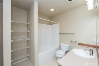 3rd floor guest bathroom and shared laundry room
