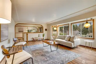 Generous in scale, this dining room accommodates large furniture or multiple cozy arrangements and anchors the home’s gathering spaces