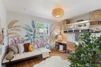 Bedroom 2 with custom desk and shelving, green vistas