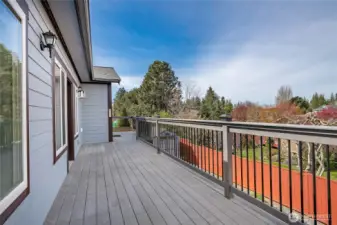 Deck on west side of home.  Door off the Living/Dining rooms.