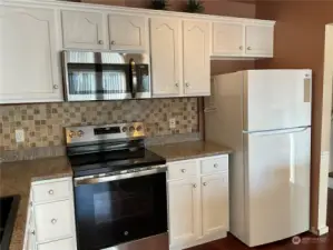 Many cabinets in the Kitchen