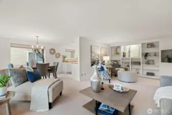 Open living room with custom built-ins.