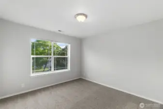 Bedroom number one at the front of the house. New carpet throughout.