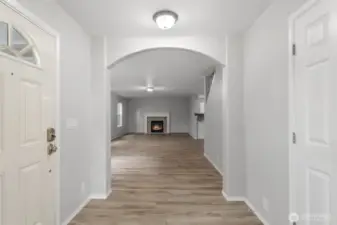Spacious entry. Inside this coat closet is a brilliant hanging organization system for coats and more.