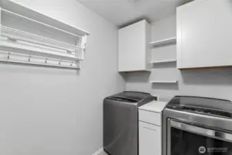 The laundry room is conveniently located upstairs, where the dirty clothes are!
