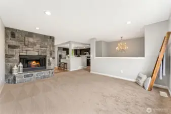Living room with wood burning fireplace