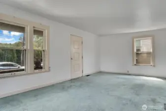 You enter into the south facing living room.