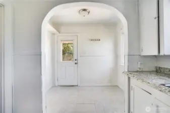 Perfect eating nook and/or build in some cabinets to hang coats and backpacks.
