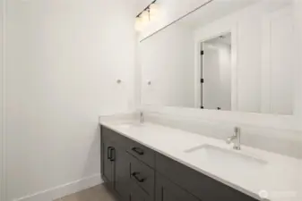 basement shared dual sink bathroom