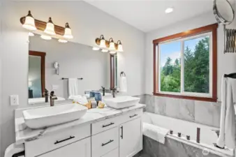 Huge, luxurious primary bathroom.