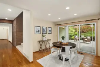 Nook area off kitchen and sliding door that leads to huge low maintenance composite deck