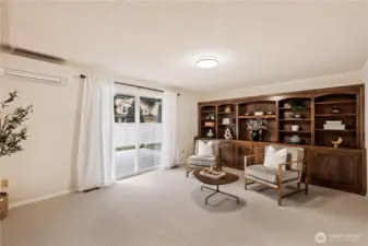 Built-ins for showcase items, books, art, with storage underneath.