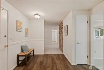 Entry to kitchen from garage on left. Add a table for shopping bags, and access to pantry closet in kitchen.