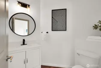 Updated guest bathroom with modern finishes and clean design.