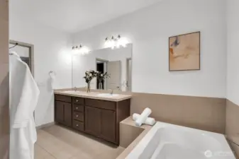 Spa-like master bathroom feels like a private retreat.