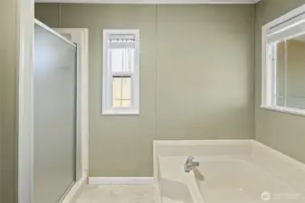 Primary bath with soaking tub and walk-in shower!