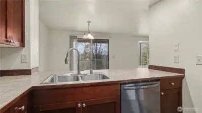 Kitchen opens to the living and dining room areas; perfect for entertaining.