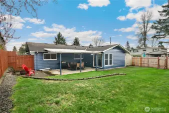 Handy shed and greenhouse included.