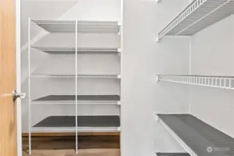 The spacious pantry offers motion light.