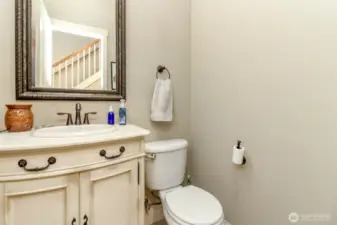 Main floor guest bathroom w/custom vanity!