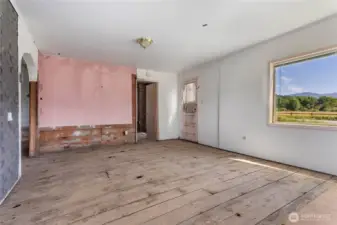 Home was damaged by a water leak. Stripped down to sub-floor and studs in most areas of home.