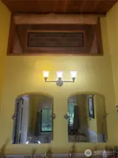 Primary double skinks and vaulted ceilings with stained glass.