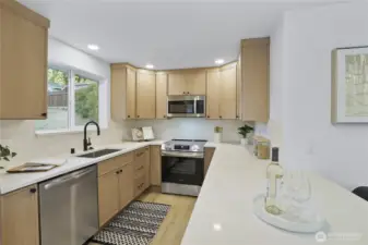 Stunning thin shaker cabs with New SS appliances and Quartz counters ooh la la!