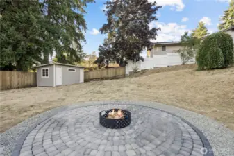 large pavered firepit area for laughs and memories