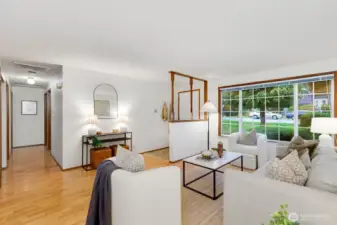 Another view of the living room and front entry.