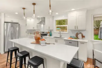 Quartz counter tops and stainless appliances