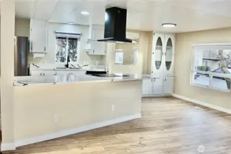 Entering from carport, the kitchen and the living room as well as dining room