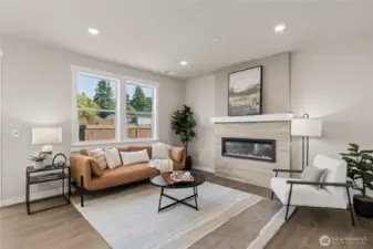 Photo showing a staged home within the community on a different homesite.  This home will have a much larger back yard!