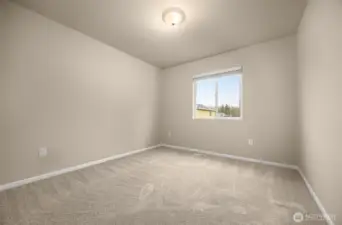 Upstairs bedroom with walk in closet.